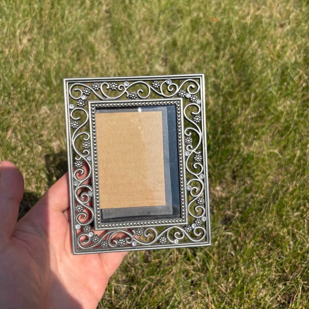 Small metal picture frame with floral and bedazzled design